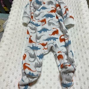 Multicolored dinosaur footsie pajamas. 0-3 months. Dinosaur claw feet. Very cute